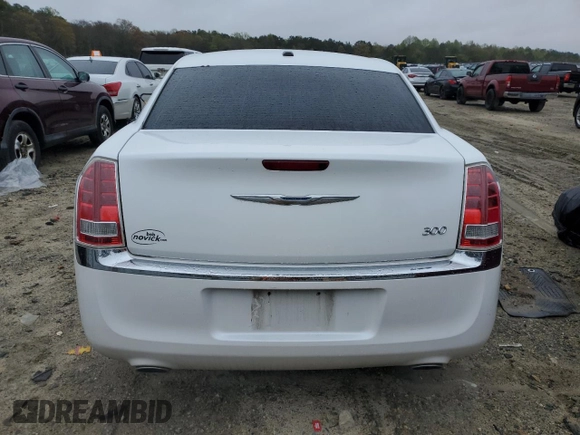 2014 Chrysler 300 with VIN 2C3CCAAG9EH305803, listed as a Copart auction lot 52759535 with 148,689 mi miles and Salvage Title. Bid and sale history available at DreamBid. Image 6.