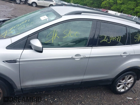 2018 Ford Escape SE with VIN 1FMCU9G99JUC41605, listed as a IAAI auction lot 39500946 with 114,032 mi miles. Bid and sale history available at carsss.com. Image 14.