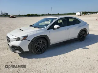 2022 Subaru WRX Premium с VIN JF1VBAF69N9032858, выставлен на аукционе Copart как лот 52590445 с пробегом 21 177 миль миль и Списание • Salvage title. История ставок и продаж доступна на DreamBid. Изображение 1.