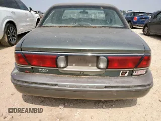 1999 Buick LeSabre Limited z VIN 1G4HR52K5XH469192, wystawiony jako Copart lot #57516205 z przebiegiem 102 413 mil mil oraz Czysty tytuł • Clean title. Historia ofert i sprzedaży dostępna na DreamBid. Obrazek 6.