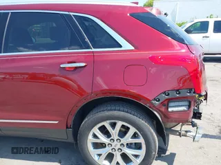 2017 Cadillac XT5 Luxury FWD z VIN 1GYKNBRS3HZ293677, wystawiony jako IAAI lot #42043025 z przebiegiem 89 975 mil mil oraz . Historia ofert i sprzedaży dostępna na DreamBid. Obrazek 21.
