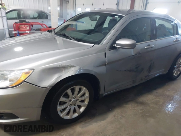 2014 Chrysler 200 Touring with VIN 1C3CCBBB0EN107711, listed as a IAAI auction lot 41576219 with 128,052 mi miles. Bid and sale history available at carsss.com. Image 6.