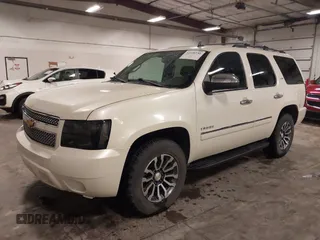 2012 Chevrolet Tahoe LTZ with VIN 1GNSKCE07CR227674, listed as a IAAI auction lot 42166732 with 204,171 mi miles and . Bid and sale history available at DreamBid. Image 18.