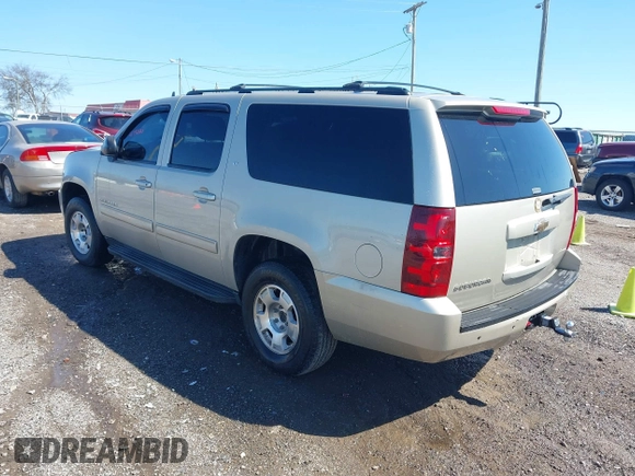 2014 Chevrolet Suburban LT with VIN 1GNSCJE07ER120130, listed as a IAAI auction lot 41792310 with 238,313 mi miles. Bid and sale history available at carsss.com. Image 3.