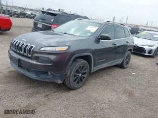 2016 Jeep Cherokee 75th Anniversary with VIN 1C4PJLCB9GW166857, listed as a IAAI auction lot 41435610 with 130,856 mi miles. Bid and sale history available at carsss.com. Image 2.