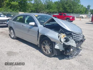 2007 Chrysler Sebring Touring z VIN 1C3LC56KX7N527801, wystawiony jako IAAI lot #42372386 z przebiegiem 158 039 mil mil oraz . Historia ofert i sprzedaży dostępna na DreamBid. Obrazek 1.