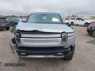 2024 Rivian R1S Adventure with VIN 7PDSGABA9RN043583, listed as a IAAI auction lot 41617148 with Not Provided miles. Bid and sale history available at carsss.com. Image 12.