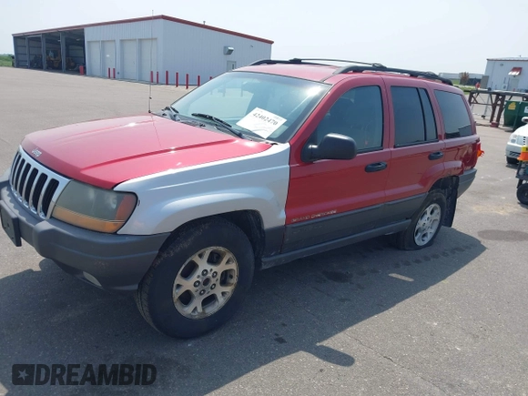 2001 Jeep Grand Cherokee Laredo with VIN 1J4GW48S81C727262, listed as a IAAI auction lot 42402470 with 228,167 mi miles and . Bid and sale history available at DreamBid. Image 2.