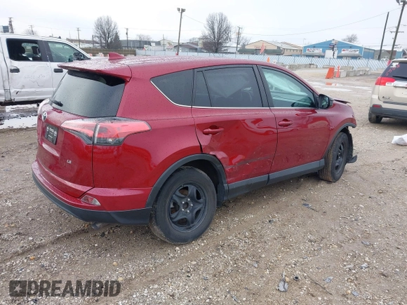 2018 Toyota RAV4 LE with VIN 2T3ZFREV9JW514778, listed as a IAAI auction lot 41202060 with 99,405 mi miles. Bid and sale history available at carsss.com. Image 4.