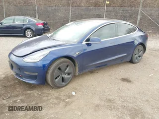 2018 Tesla Model 3 Long Range Battery with VIN 5YJ3E1EB2JF056166, listed as a IAAI auction lot 41847972 with 126,126 mi miles and . Bid and sale history available at DreamBid. Image 2.