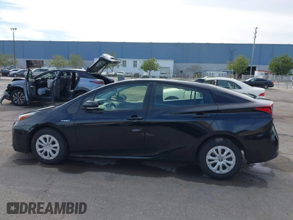 2022 Toyota Prius L Eco with VIN JTDKAMFU2N3157283, listed as a IAAI auction lot 41620334 with 59,754 mi miles and . Bid and sale history available at DreamBid. Image 13.