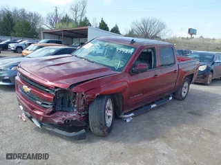 2016 Chevrolet Silverado 1500 LT with VIN 3GCUKREC0GG354271, listed as a IAAI auction lot 38948207 with 130,369 mi miles. Bid and sale history available at carsss.com. Image 17.