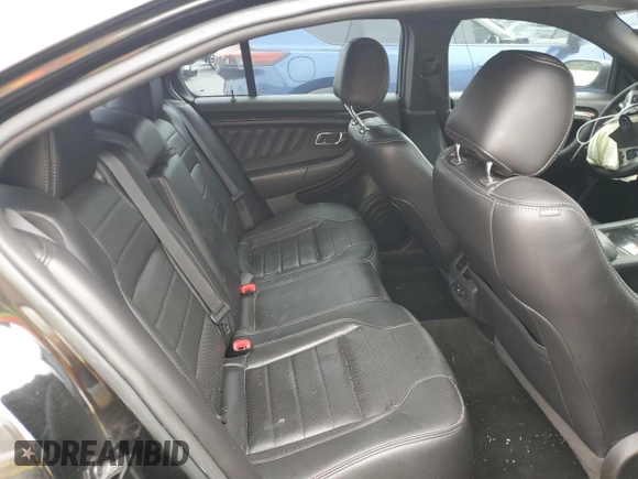2013 Ford Taurus SHO with VIN 1FAHP2KT6DG211496, listed as a Copart auction lot 63424445 with 123,742 mi miles and Salvage title. Bid and sale history available at DreamBid. Image 10.