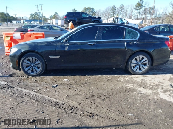 2011 BMW 7 Series 740i with VIN WBAKA4C58BC392020, listed as a IAAI auction lot 41314751 with 116,553 mi miles. Bid and sale history available at carsss.com. Image 14.