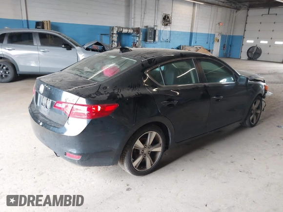 2014 Acura ILX Technology z VIN 19VDE1F71EE005731, wystawiony jako IAAI lot #42279107 z przebiegiem 84 083 mil mil oraz . Historia ofert i sprzedaży dostępna na DreamBid. Obrazek 4.