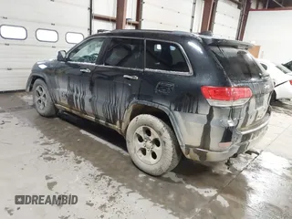 2014 Jeep Grand Cherokee Limited with VIN 1C4RJFBT1EC156536, listed as a IAAI auction lot 41053655 with 204,008 mi miles and . Bid and sale history available at DreamBid. Image 3.