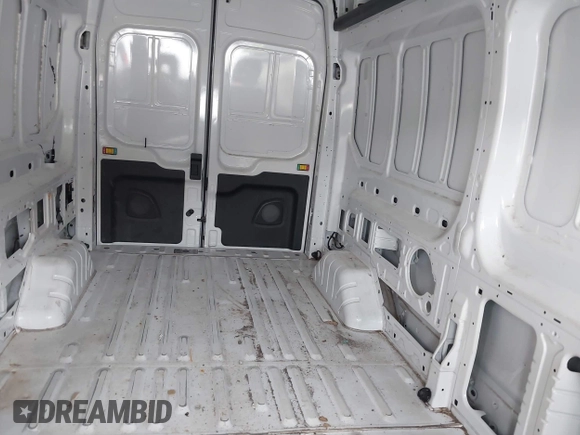 2023 Ford Transit Cargo with VIN 1FTBR2X81PKB38408, listed as a IAAI auction lot 42608271 with 28,384 mi miles and . Bid and sale history available at DreamBid. Image 8.