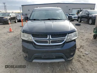 2011 Dodge Journey LUX with VIN 3D4PH9FG2BT535016, listed as a Copart auction lot 77885214 with 173,718 mi miles and Clean title. Bid and sale history available at DreamBid. Image 5.