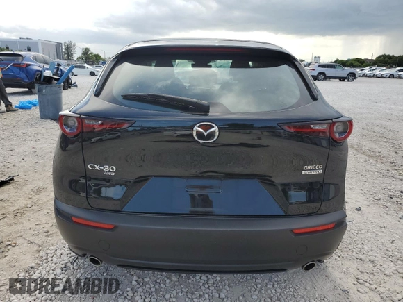 2023 Mazda CX-30 S z VIN 3MVDMBAM1PM537694, wystawiony jako Copart lot #57892645 z przebiegiem 28 733 mil mil oraz Szkoda całkowita • Salvage title. Historia ofert i sprzedaży dostępna na DreamBid. Obrazek 6.