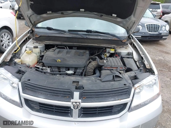 2010 Dodge Avenger SXT with VIN 1B3CC4FB1AN102546, listed as a IAAI auction lot 41843252 with 319,250 mi miles. Bid and sale history available at carsss.com. Image 10.
