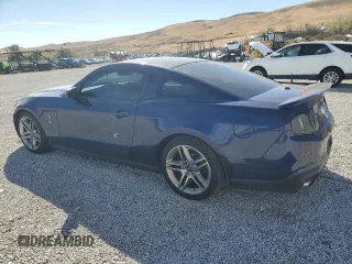2010 Ford Mustang GT500 with VIN 1ZVBP8JS1A5105926, listed as a Copart auction lot 77398504 with 63,699 mi miles and Salvage title. Bid and sale history available at DreamBid. Image 2.