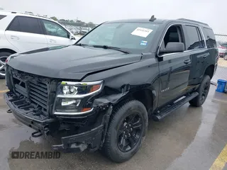 2020 Chevrolet Tahoe LS with VIN 1GNSCAKC5LR275173, listed as a IAAI auction lot 41931311 with 86,780 mi miles and . Bid and sale history available at DreamBid. Image 2.