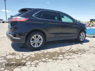 2020 Ford Edge SEL с VIN 2FMPK4J94LBA81516, выставлен на аукционе Copart как лот 56176725 с пробегом 129 952 миль миль и Списание • Salvage title. История ставок и продаж доступна на DreamBid. Изображение 3.