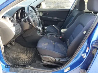 2006 Mazda 3 S Grand Touring with VIN JM1BK343861434940, listed as a Copart auction lot 63624024 with 56,737 mi miles and Salvage Title. Bid and sale history available at DreamBid. Image 7.
