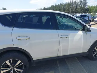 2018 Toyota RAV4 XLE with VIN JTMWFREV3JD130995, listed as a IAAI auction lot 42183630 with 56,624 mi miles. Bid and sale history available at carsss.com. Image 14.