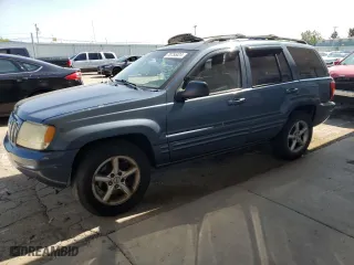 2003 Jeep Grand Cherokee Limited with VIN 1J8GW58N73C605929, listed as a Copart auction lot 70755024 with 173,147 mi miles and Salvage Title. Bid and sale history available at carsss.com. Image 1.