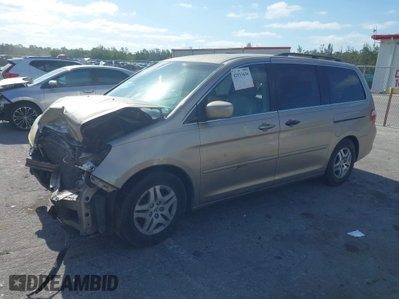 2005 Honda Odyssey EX with VIN 5FNRL38495B401742, listed as a IAAI auction lot 42133434 with 162,161 mi miles and . Bid and sale history available at carsss.com. Image 18.