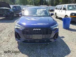 2023 Audi Q3 S line Premium Plus with VIN WA1EECF34P1117590, listed as a Copart auction lot 57404685 with 14,486 mi miles and Salvage title. Bid and sale history available at DreamBid. Image 5.