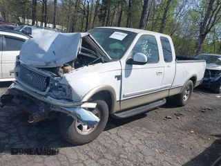 1999 Ford F-150 XL with VIN 2FTRX17L6XCB21286, listed as a IAAI auction lot 41891244 with Not provided miles and . Bid and sale history available at DreamBid. Image 2.