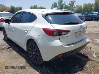 2016 Mazda 3 i Grand Touring with VIN JM1BM1N71G1283330, listed as a IAAI auction lot 42493686 with 148,032 mi miles and . Bid and sale history available at DreamBid. Image 3.