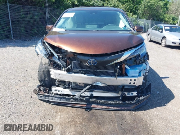2021 Toyota Sienna LE z VIN 5TDKRKEC0MS062918, wystawiony jako IAAI lot #42382540 z przebiegiem 54 271 mil mil oraz . Historia ofert i sprzedaży dostępna na DreamBid. Obrazek 6.
