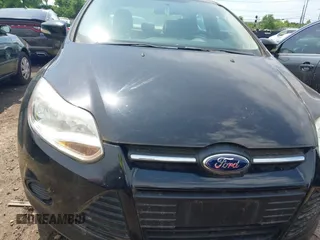 2013 Ford Focus SE z VIN 1FADP3F27DL183754, wystawiony jako IAAI lot #42677654 z przebiegiem 117 966 mil mil oraz . Historia ofert i sprzedaży dostępna na DreamBid. Obrazek 11.
