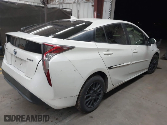 2016 Toyota Prius Two with VIN JTDKBRFU3G3513060, listed as a IAAI auction lot 41789034 with 153,391 mi miles and . Bid and sale history available at DreamBid. Image 4.