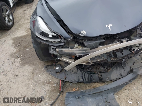 2022 Tesla Model 3 Long Range z VIN 5YJ3E1EB8NF315359, wystawiony jako IAAI lot #42035599 z przebiegiem 54 974 mil mil oraz . Historia ofert i sprzedaży dostępna na DreamBid. Obrazek 21.