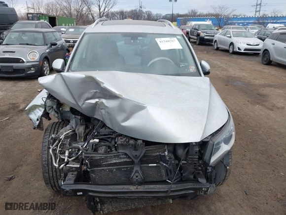 2017 Volkswagen Tiguan Wolfsburg Edition with VIN WVGSV7AX8HK031345, listed as a IAAI auction lot 41348567 with 130,313 mi miles. Bid and sale history available at carsss.com. Image 12.