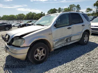 2001 Mercedes-Benz M-Class with VIN 4JGAB54EX1A271687, listed as a Copart auction lot 57046944 with 209,561 mi miles and Salvage Title. Bid and sale history available at carsss.com. Image 1.