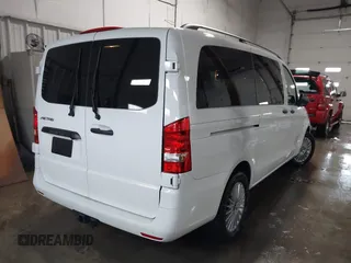 2023 Mercedes-Benz Metris with VIN W1WV0FEY8P4332203, listed as a IAAI auction lot 41510870 with 8,203 mi miles and . Bid and sale history available at DreamBid. Image 4.