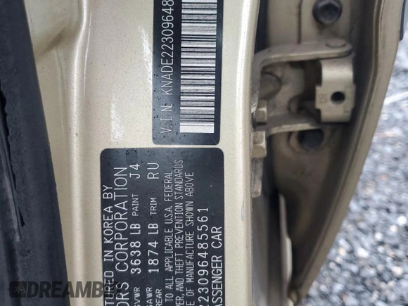 2009 Kia Rio LX with VIN KNADE223096485561, listed as a Copart auction lot 73412874 with 137,858 mi miles and Salvage Title. Bid and sale history available at DreamBid. Image 12.