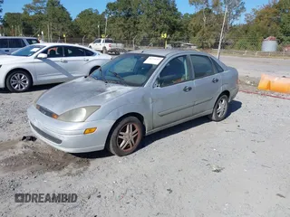 2003 Ford Focus SE z VIN 1FAFP34Z23W257426, wystawiony jako IAAI lot #40736207 z przebiegiem 87 447 mil mil oraz . Historia ofert i sprzedaży dostępna na DreamBid. Obrazek 2.