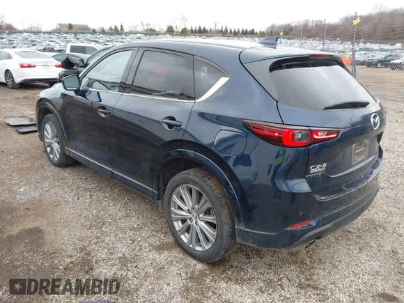 2023 Mazda CX-5 Signature with VIN JM3KFBXY5P0251046, listed as a IAAI auction lot 41505815 with 37,594 mi miles and . Bid and sale history available at carsss.com. Image 3.