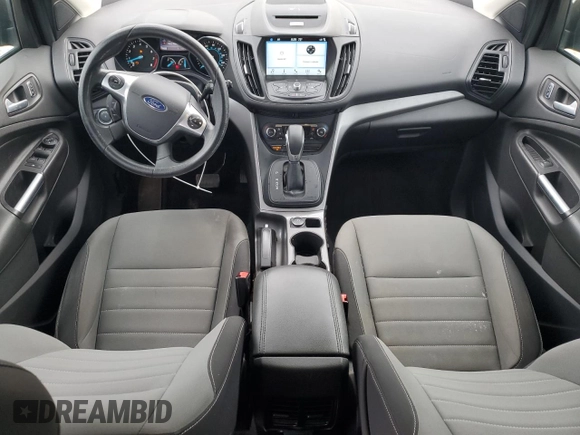 2016 Ford Escape SE z VIN 1FMCU0GX9GUB56962, wystawiony jako Copart lot #57071515 z przebiegiem 150 792 mil mil oraz Szkoda całkowita • Salvage title. Historia ofert i sprzedaży dostępna na DreamBid. Obrazek 8.