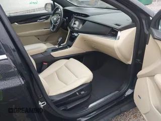 2018 Cadillac XT5 FWD with VIN 1GYKNARS6JZ160993, listed as a IAAI auction lot 41472847 with 113,415 mi miles. Bid and sale history available at carsss.com. Image 5.