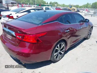 2016 Nissan Maxima SL with VIN 1N4AA6AP2GC408837, listed as a IAAI auction lot 42006849 with 228,119 mi miles and . Bid and sale history available at DreamBid. Image 4.