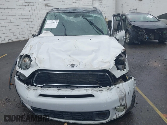 2011 MINI Countryman S z VIN WMWZC5C54BWM10154, wystawiony jako IAAI lot #37722183 z przebiegiem Nie podano mil oraz . Historia ofert i sprzedaży dostępna na DreamBid. Obrazek 11.
