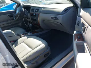 2004 Mercury Sable LS Premium with VIN 1MEHM55S64G610527, listed as a IAAI auction lot 41739433 with 34,409 mi miles. Bid and sale history available at carsss.com. Image 5.
