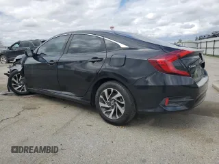2017 Honda Civic Sedan LX with VIN 2HGFC2F55HH556765, listed as a Copart auction lot 47241065 with 104,038 mi miles and Salvage Title. Bid and sale history available at carsss.com. Image 2.